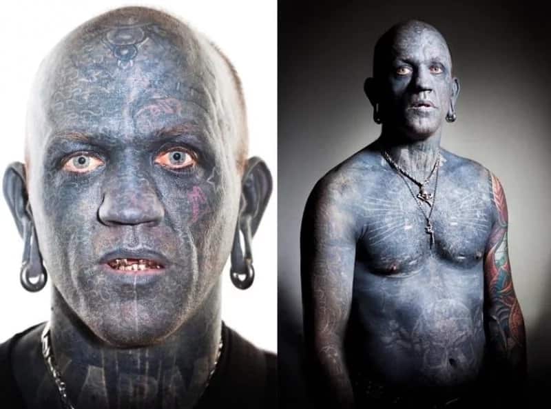 man covered with tattoos